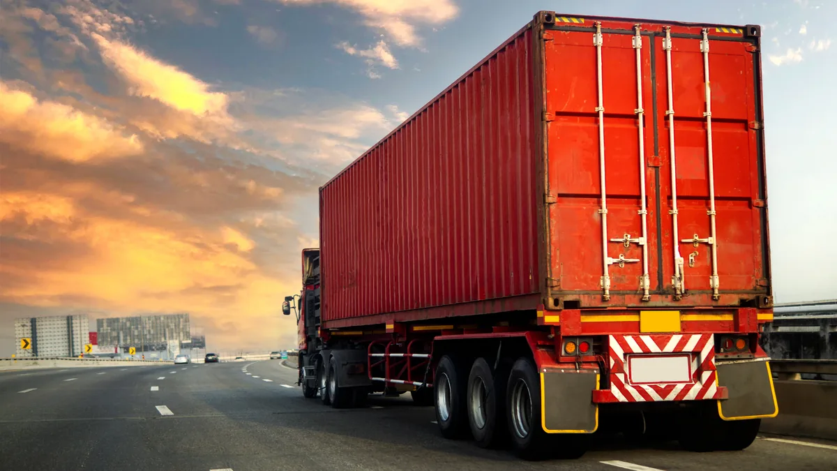 How to calculate freight charges for a loaded container truck on a USA and Europe highway